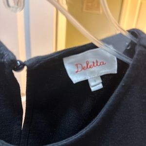 Black peplum tank from Anthropologie size small